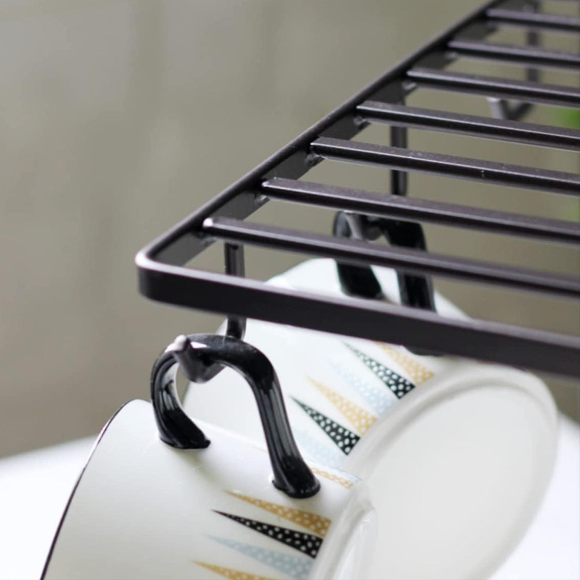 cup and saucer stand by Auctor store